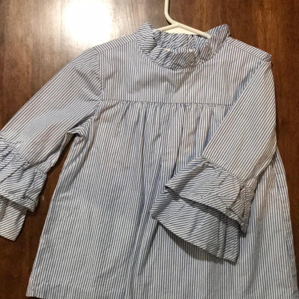 Pin stripped with ruffle half sleeve top